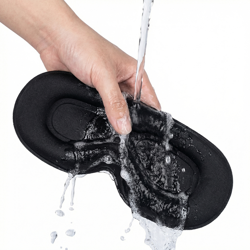 Remove electronics, then hand wash fabric